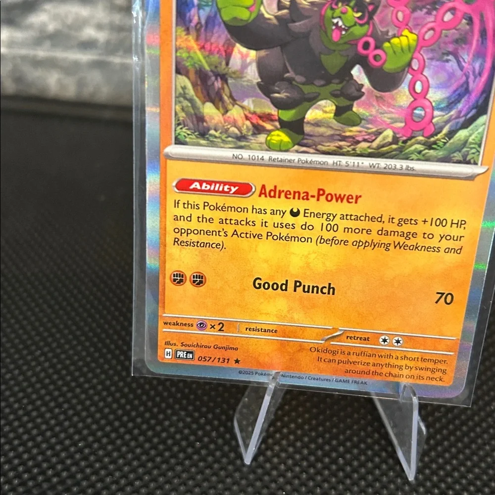 Pokemon Okidogi‎ 057/131 Holo Card from Prismatic Evolutions Set M/NM